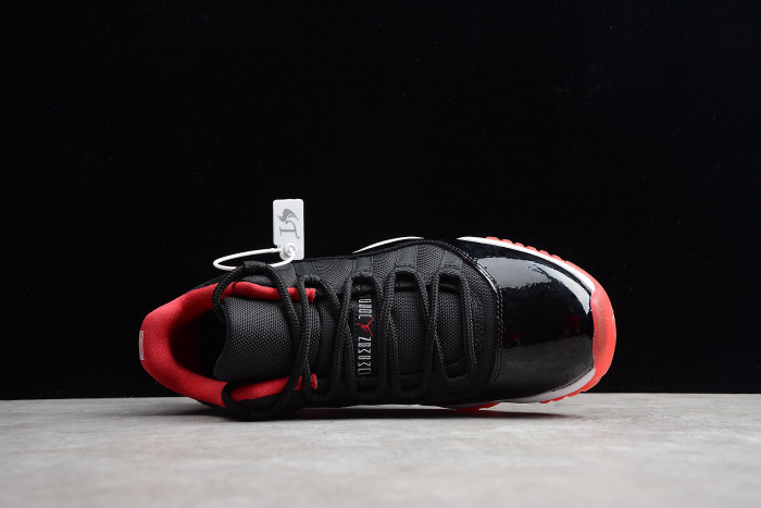 Air Jordan 11 Retro Low "Bred" Black/ Red mens 528895-012